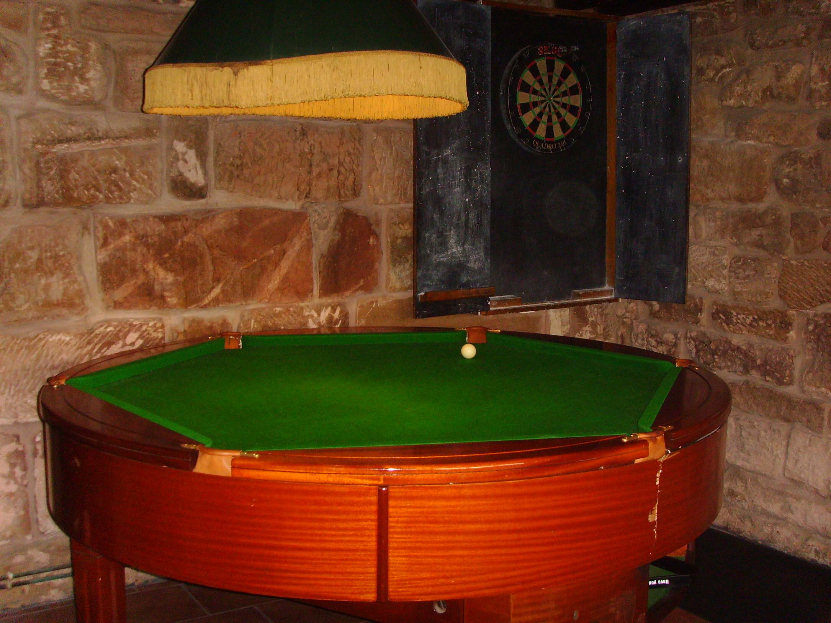 Unique round pool table at Peakstones Inn